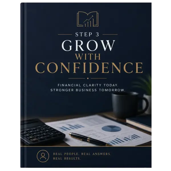 Book cover: 'Step 3 Grow with Confidence' with gold text on dark blue background; desk scene with calculator, charts, pen, mug visible at bottom edge.